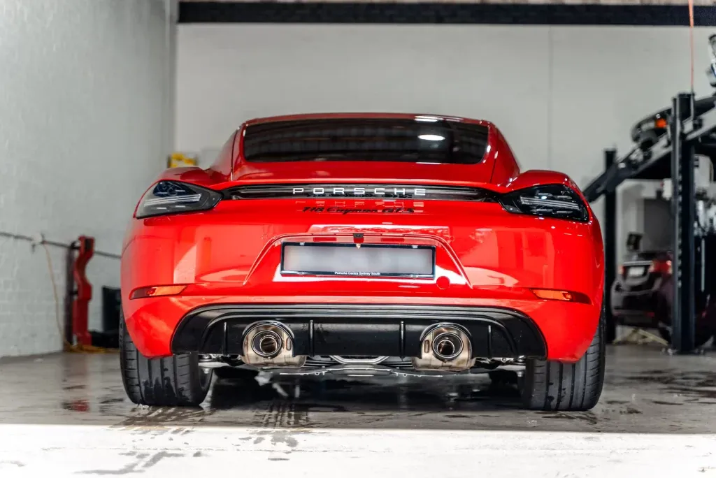 Red Porsche Cayman GT4 after detailing